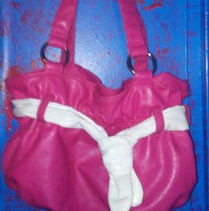 Small pink purse with white bow